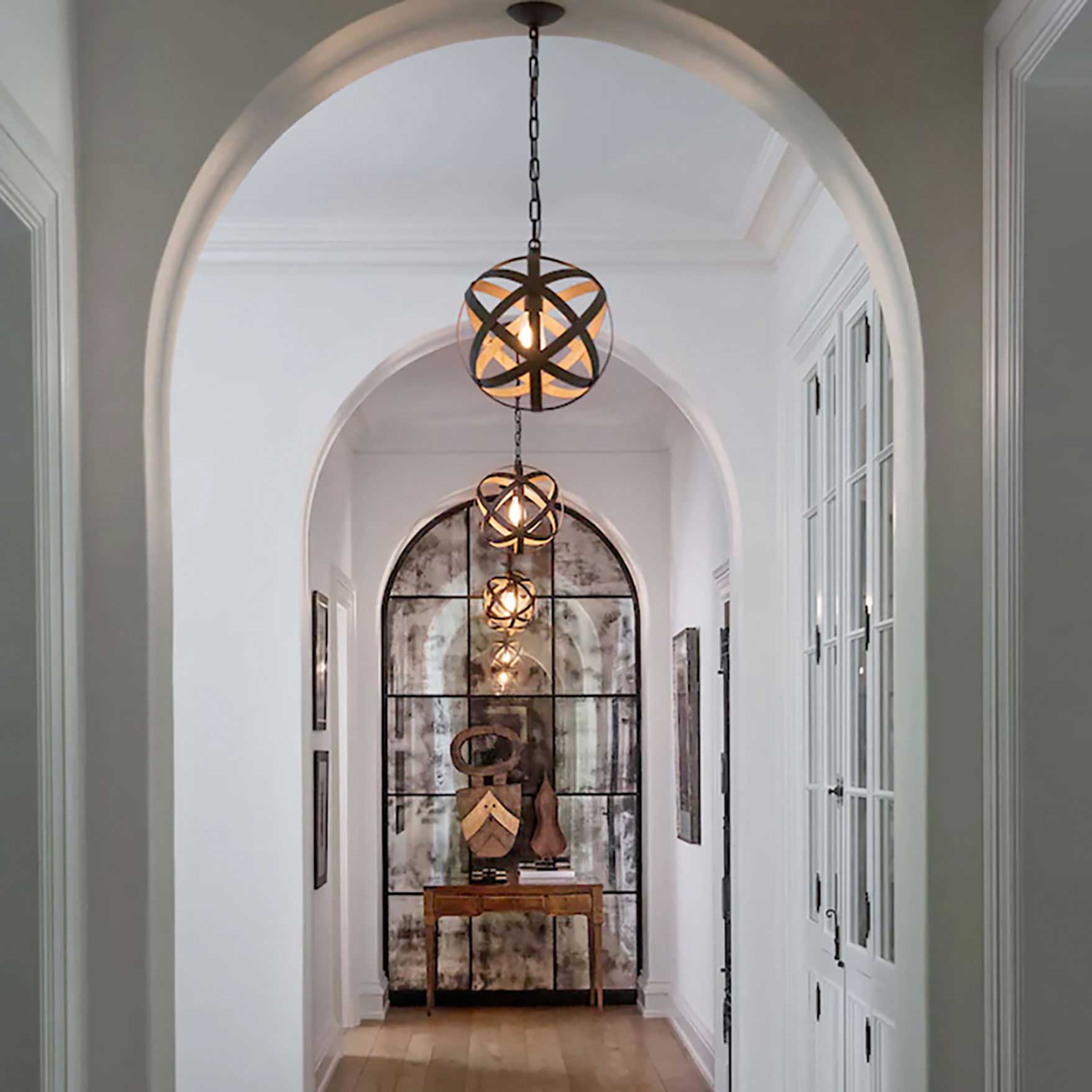 Hinkley light fixtures in hallway